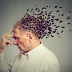 Memory loss due to dementia. Senior man losing parts of head  as symbol of decreased mind function.