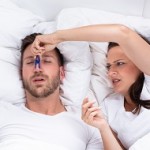 Woman Trying To Stop Man's Snoring With Clothespin